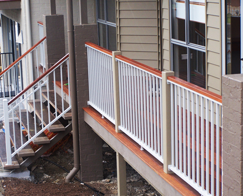 Strong and durable aluminium balustrades with a wood finish.